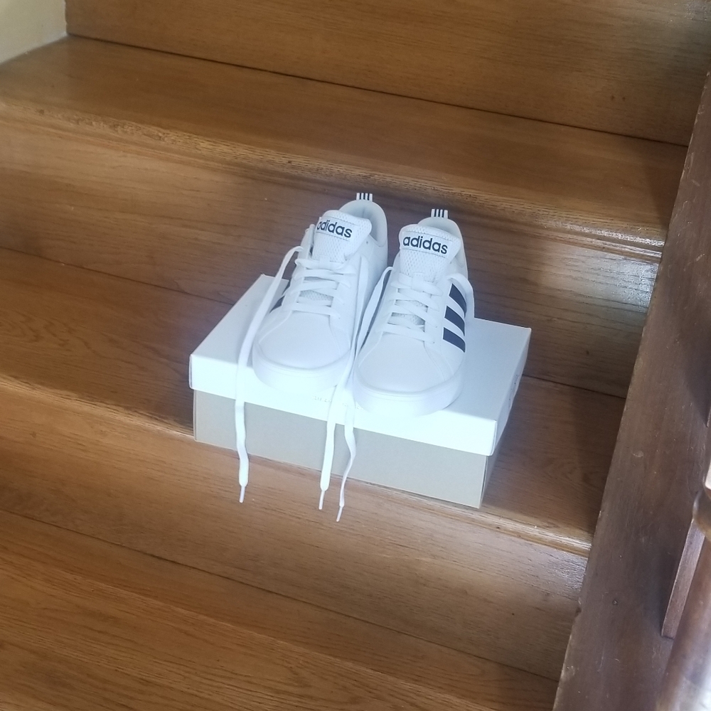 A pair of  Adidas sneakers